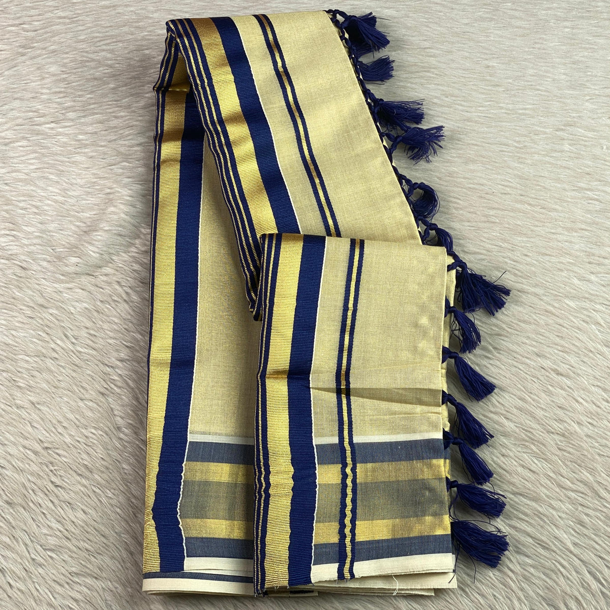 Vyshnavi Golden Tissue saree with Blue Striped Border