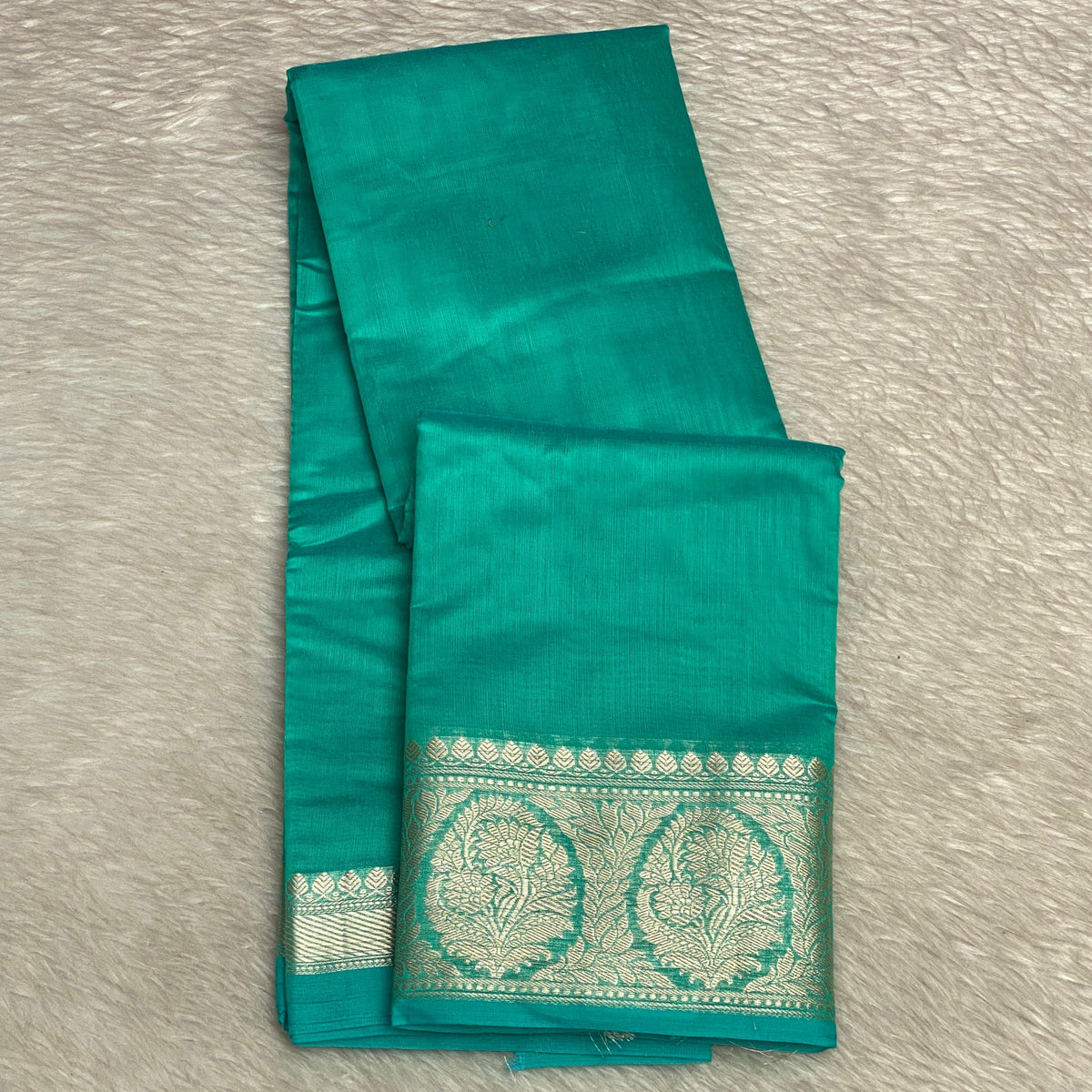 Banarasi Silk Saree in Green with Golden Zari Elegance