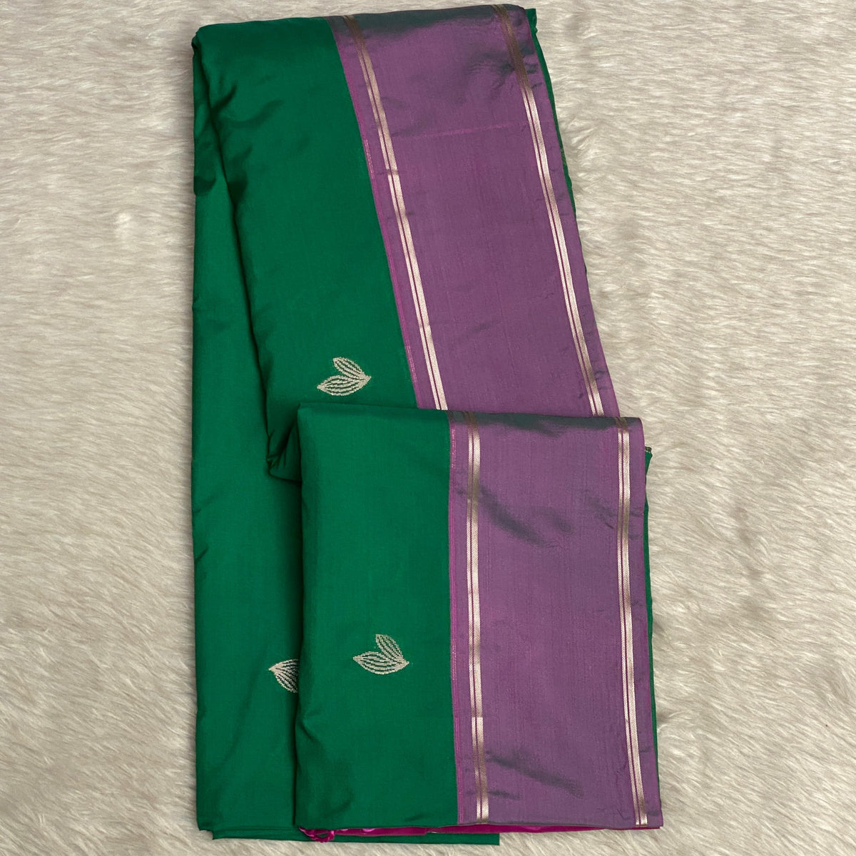 Green Kanchipuram Silk Saree with Pink Border