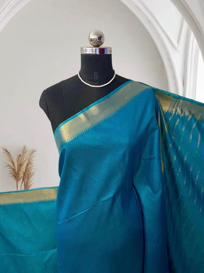 Rambha Semi Silk Saree in Light Blue with Golden Stripes