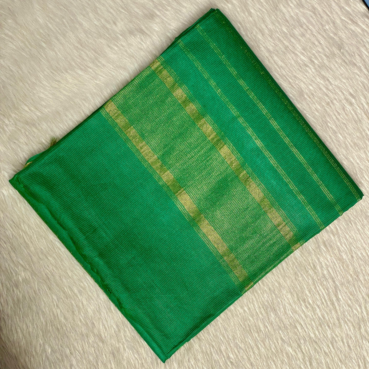 Rambha Semi Silk Saree in Light Green with Golden Stripes