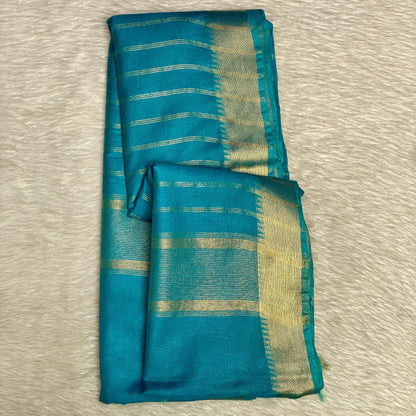 Rambha Semi Silk Saree in Light Blue with Golden Stripes