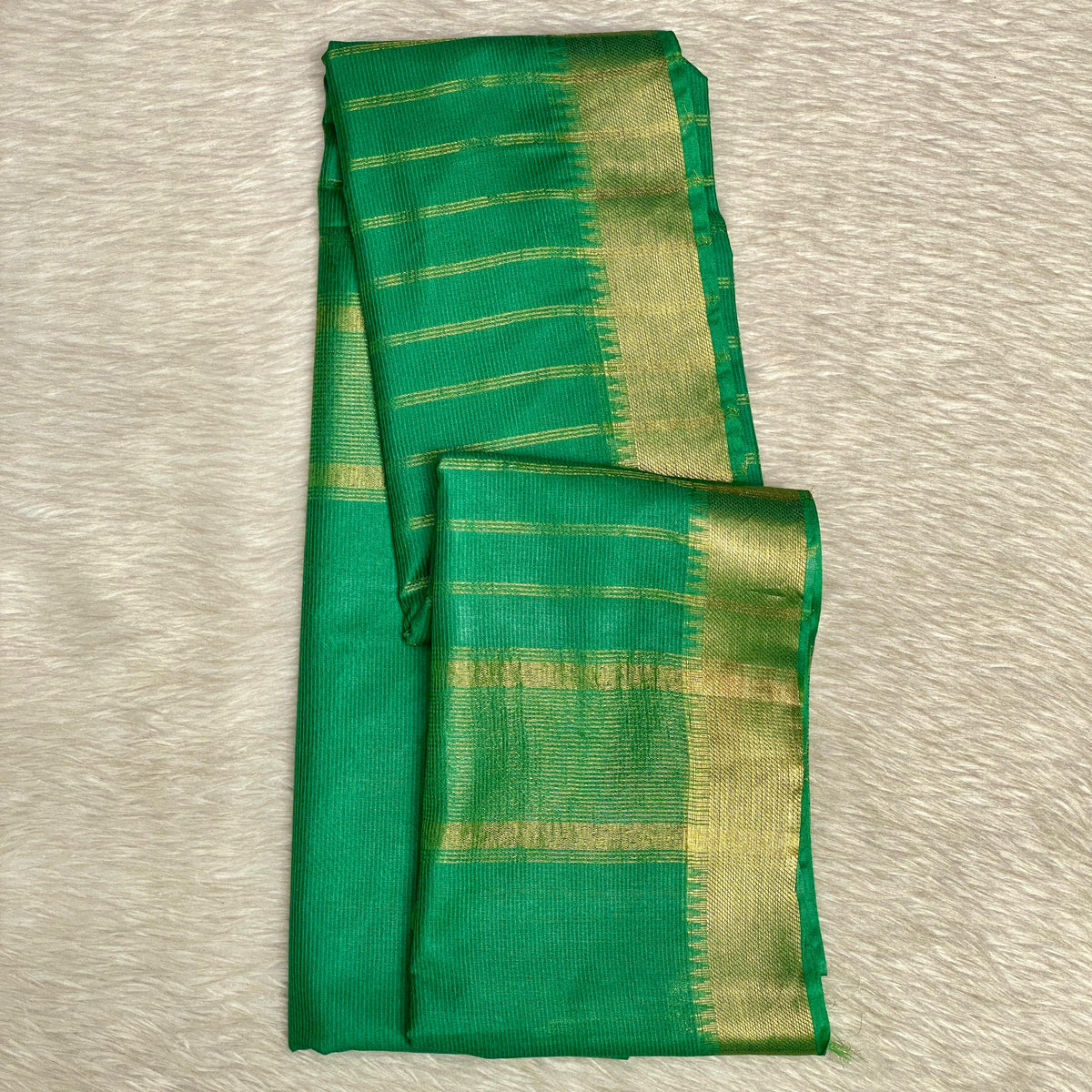 Rambha Semi Silk Saree in Light Green with Golden Stripes