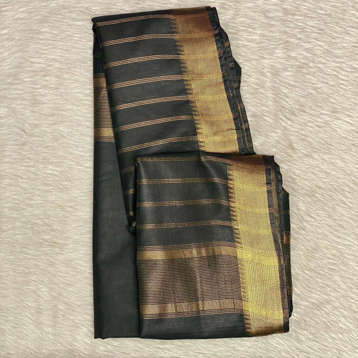 Rambha Saree in Black with Golden Stripes
