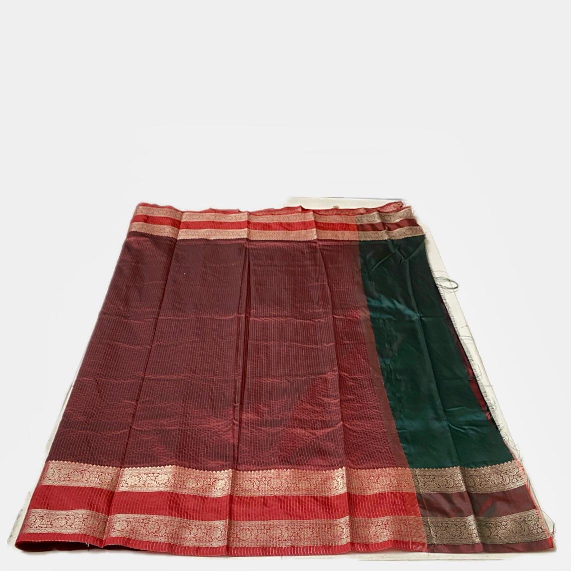 Ishani Green Semi Silk saree with Double Zari Border