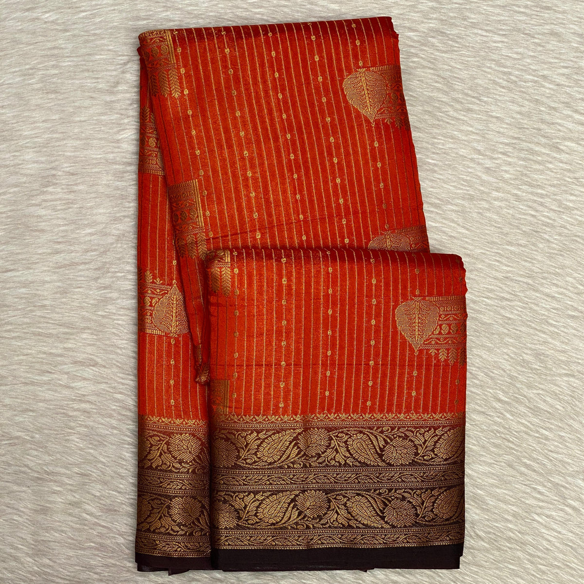 Adithi Vibrant Orange Banarasi Silk Saree with Golden Zari Border