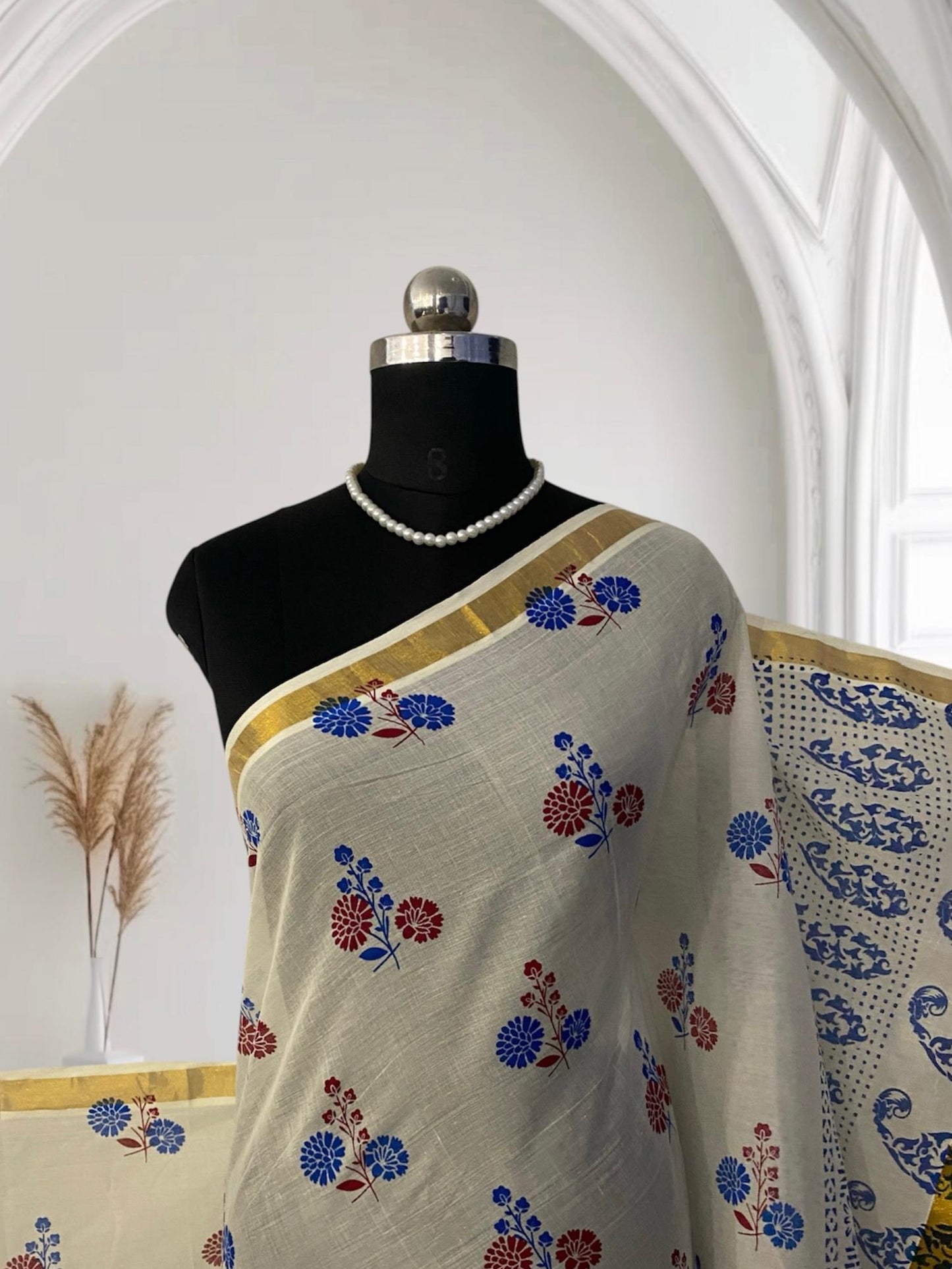 Neelambari Blue and Red Floral Print Cotton Kasavu Saree